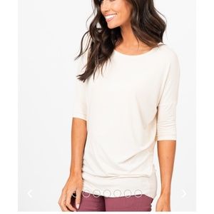 Large cream dolman top